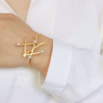 Golden Orbit Bangle
